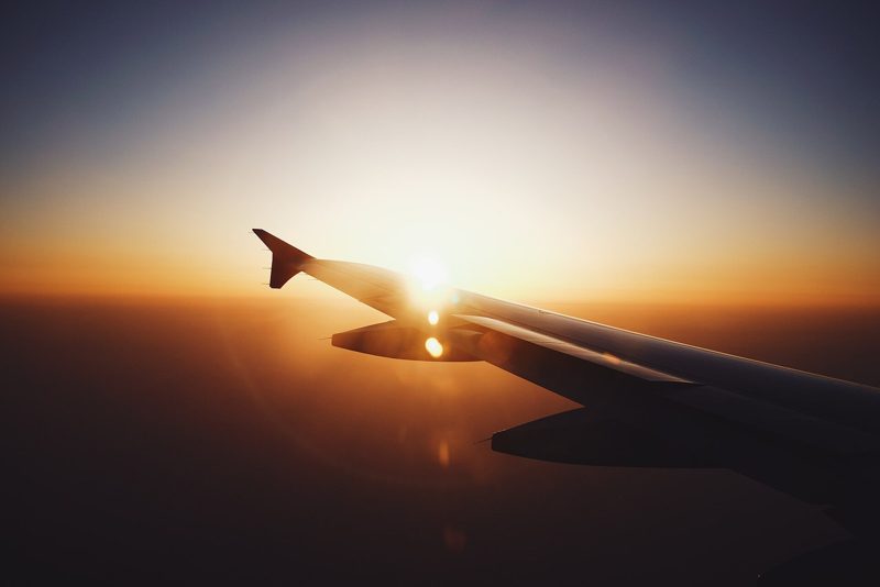 Sunset on plane (Unsplash)
